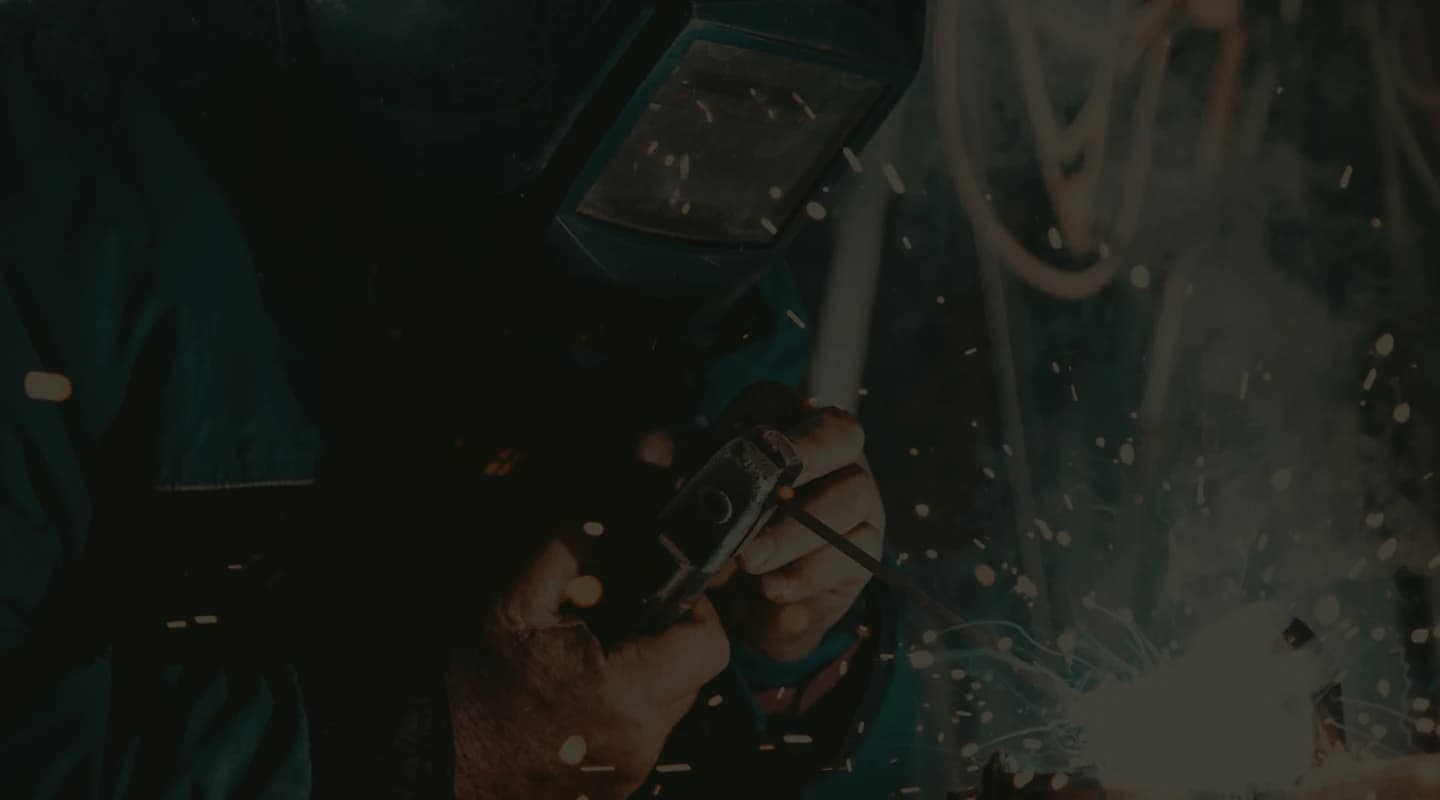 Worker working with plumbing materials.